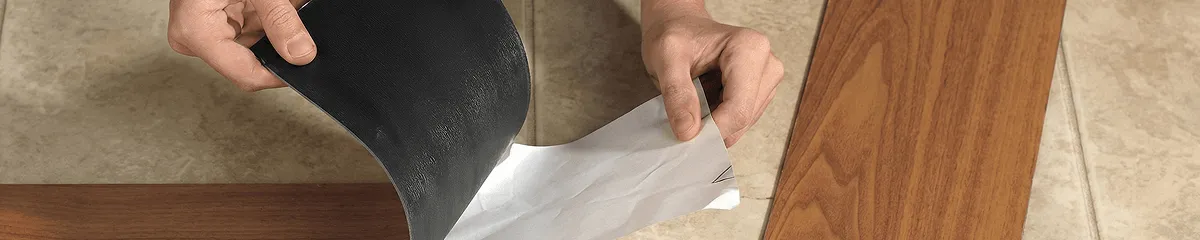 A professional installing vinyl flooring in Columbia, SC